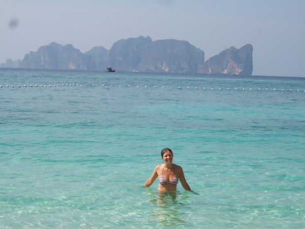 Mrs Deane relaxes in the turquoise waters of the Andaman Sea