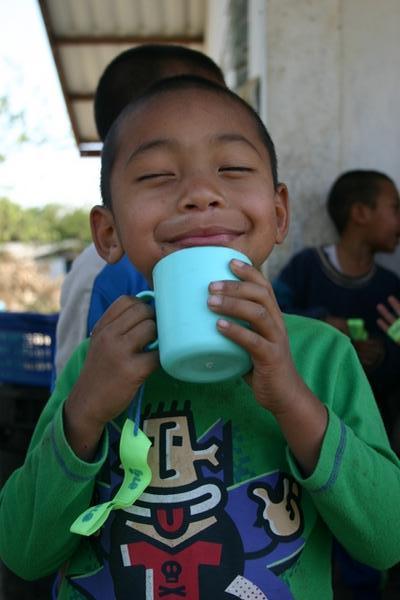 child with cup