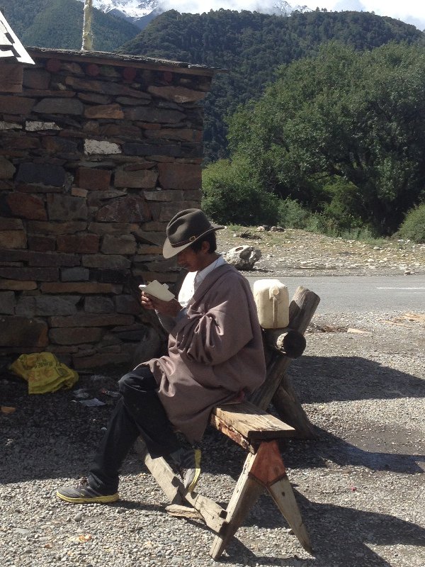A Tibetan Man Enjoying Some Afternoon Reading