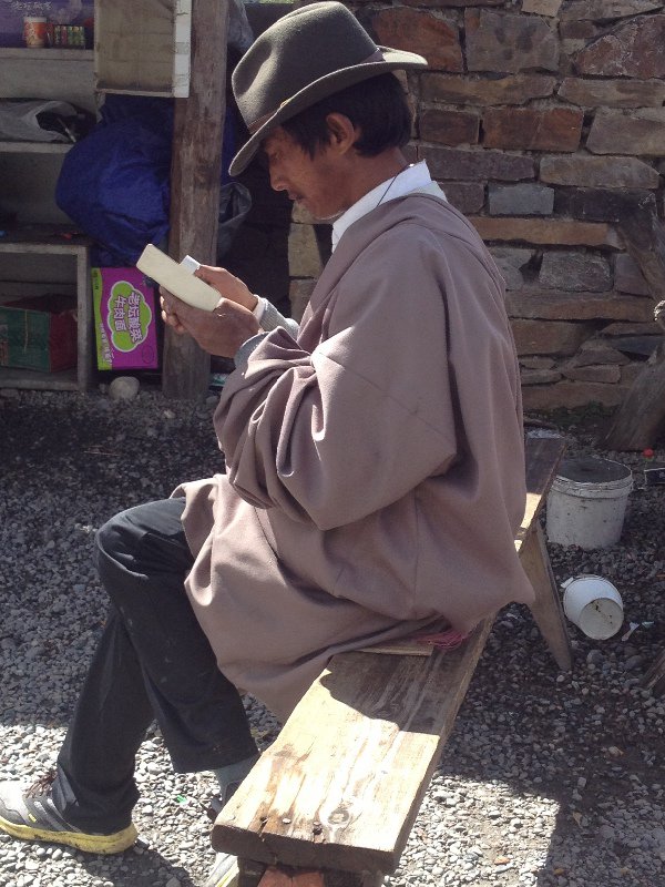 A Tibetan Man Enjoying Some Afternoon Reading