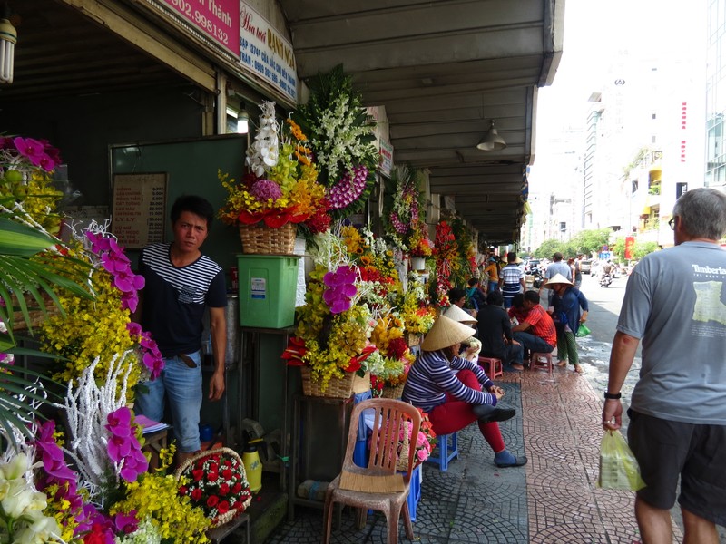 Flower market - everyone sits on little plastic steps!