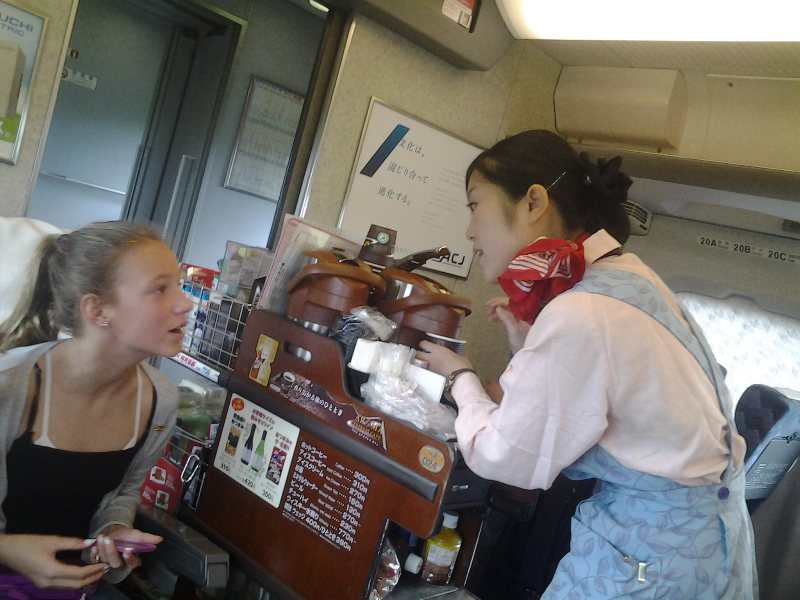 Riley ordering a snack on the shinkansen