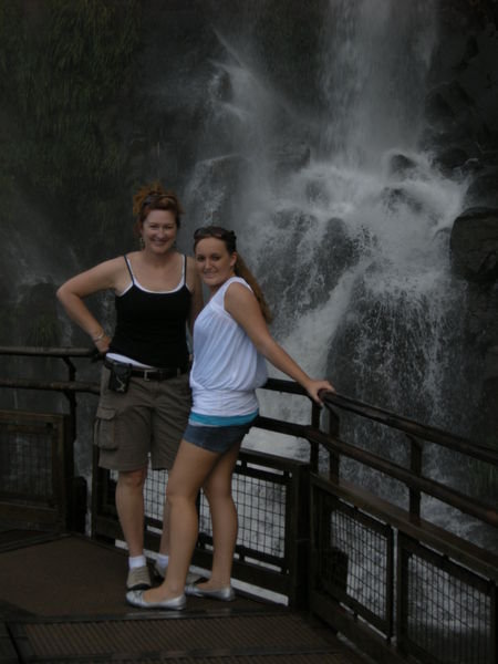 Dar and Dani getting cooled off by the falls