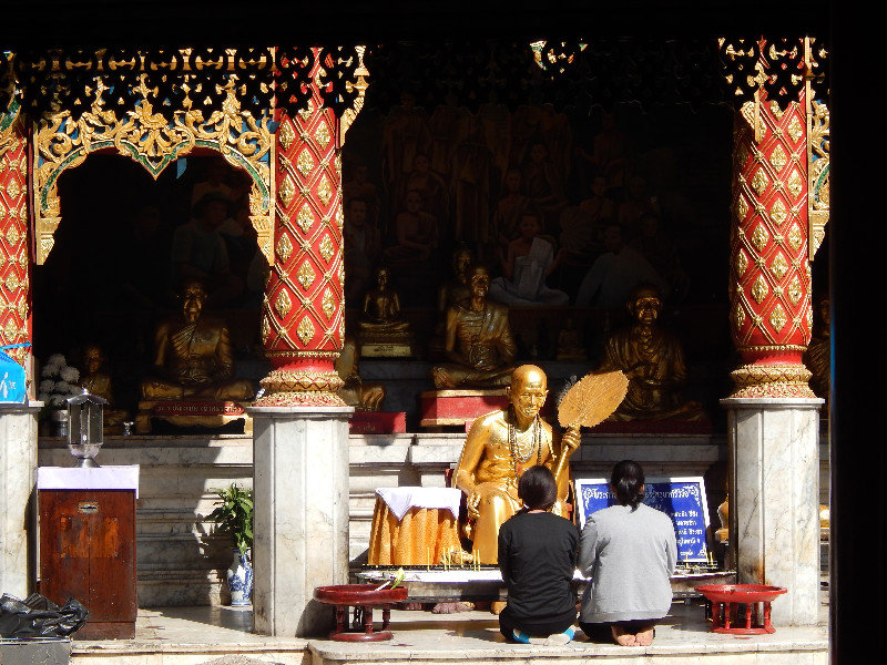 Welcoming Buddas at the temple doors