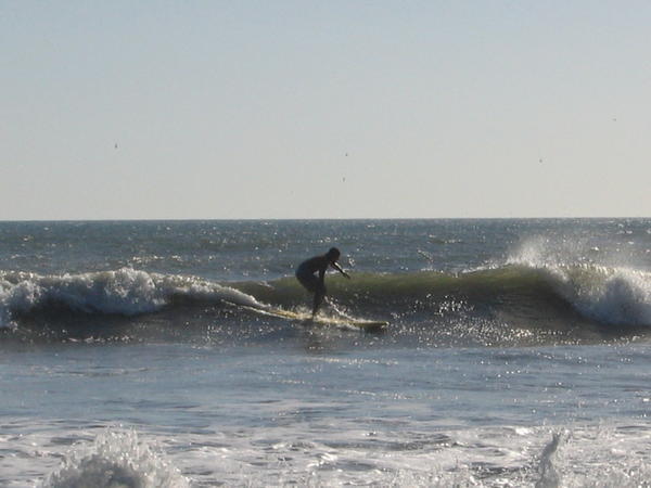 Dude surfar i Pochomil