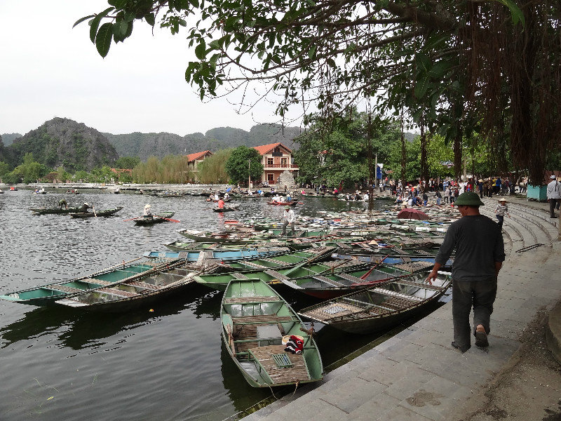 Boats to take us into Tam Coc river and limestone tunnels