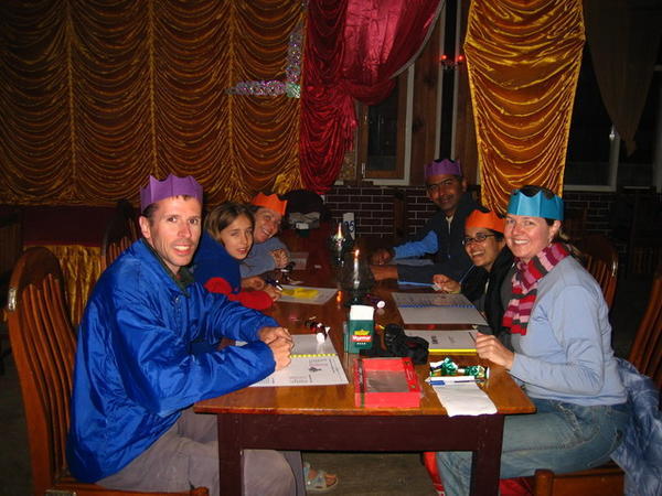 Xmas dinner with fellow travellers, Ven, Anita, Sarah and Laura - Xmas crackers and hats included for all!