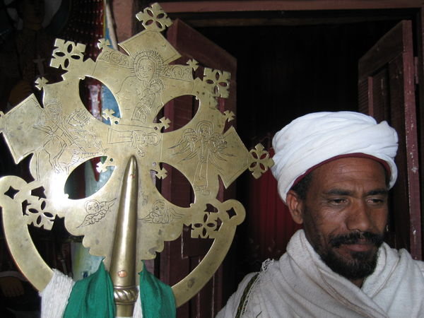 Priest with the church cross