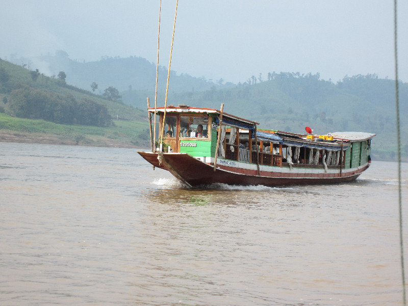 our boat cruising down the Mekong