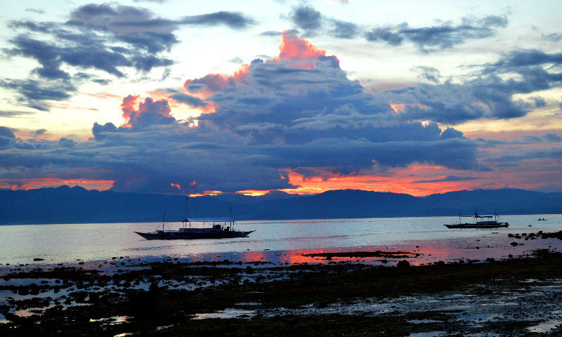 Sun setting over Negros Island