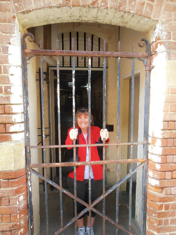 Lyn behind bars.