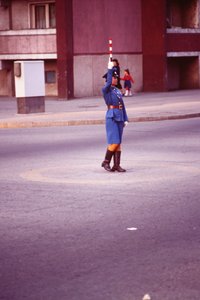 Female police officer directing traffic in Pyongyang
