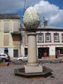 A phallus? No, an egg on a pedestal