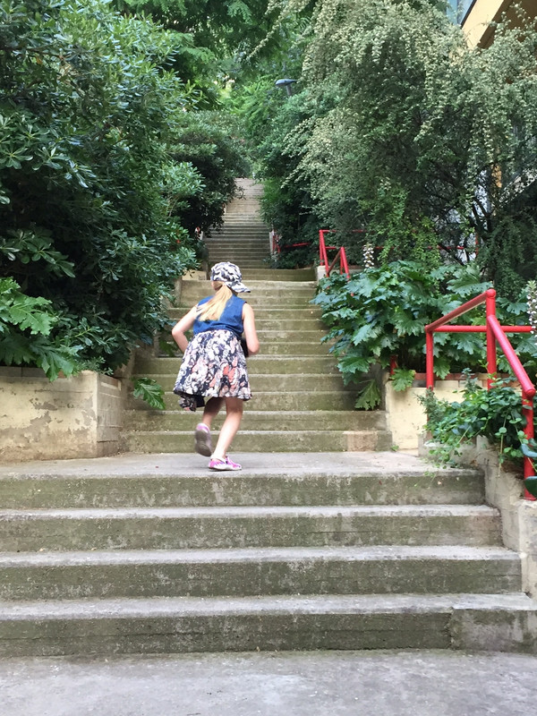Julia running up stairs