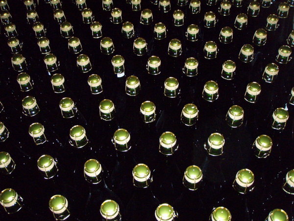 Unlabelled Bottles of Sparkling Wine