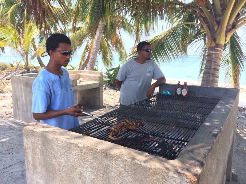 Lunch being cooked on Laughing Bird Caye