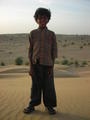 Boy on sand dune