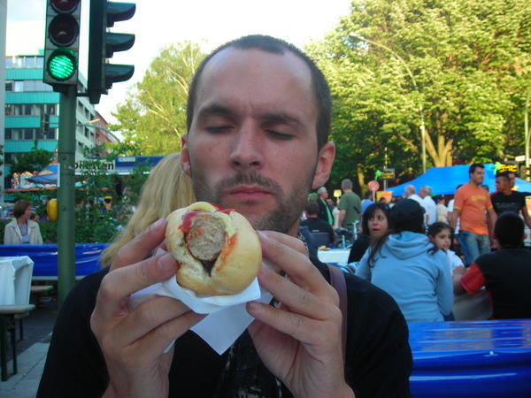 Eating a bratwurst.. yum yum