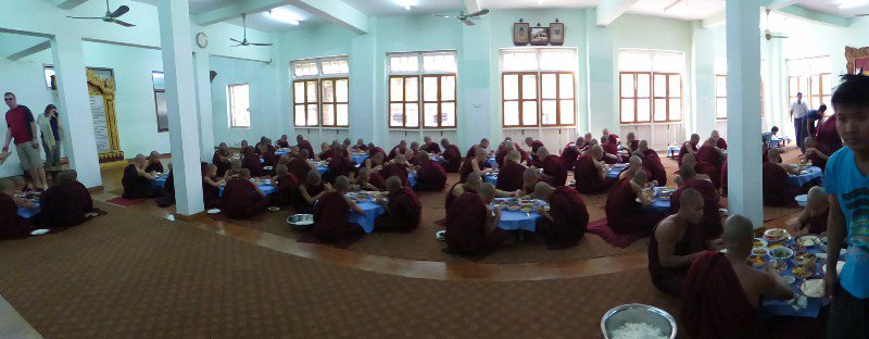 Monks enjoying their last meal of the day
