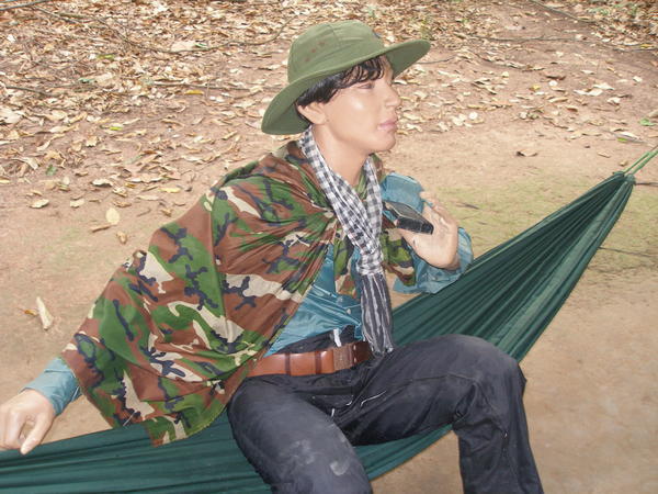 Army man in a hammock