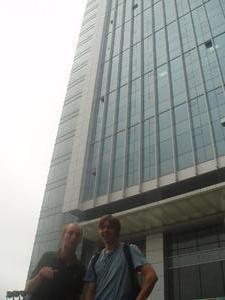 Joe and I with a big building behind us