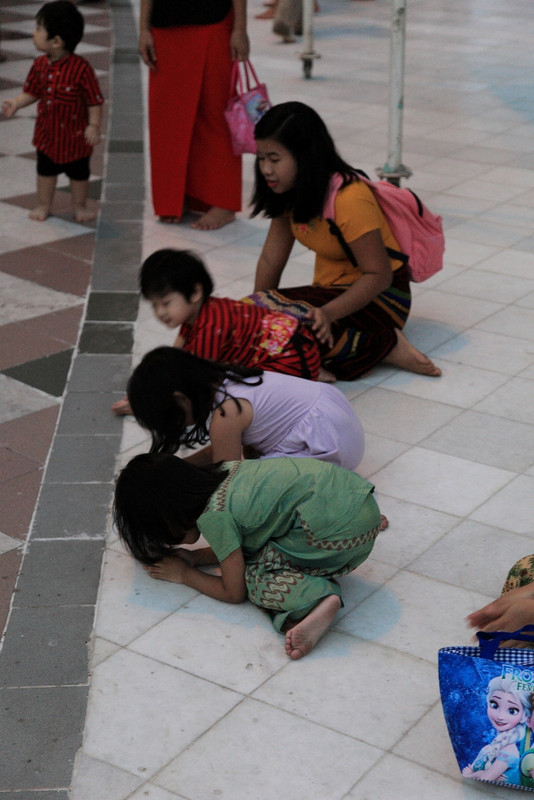 Children learning to pray at Shwedagon