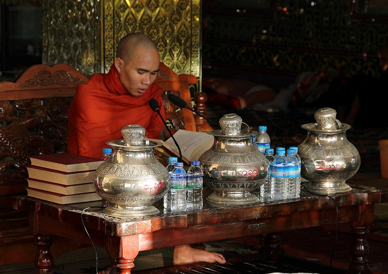 Monk reciting scriptures