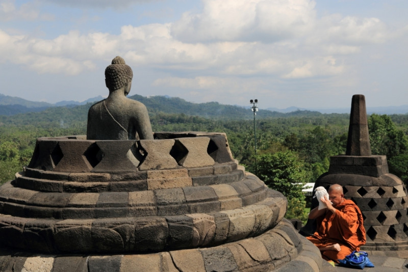 Monk praying at Borobudur
