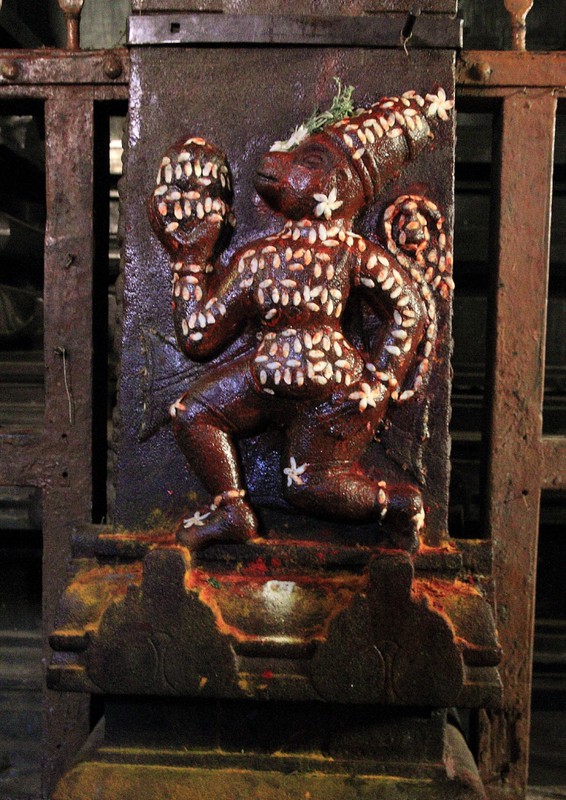 Hanuman, the monkey god, with rice grains adhered