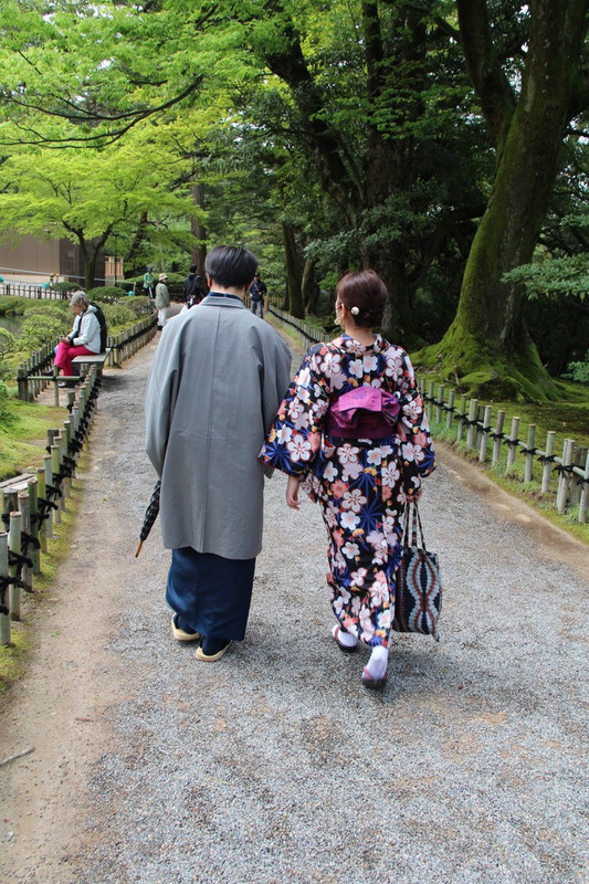 Kenrokuen Gardens - young people in traditional clothing.