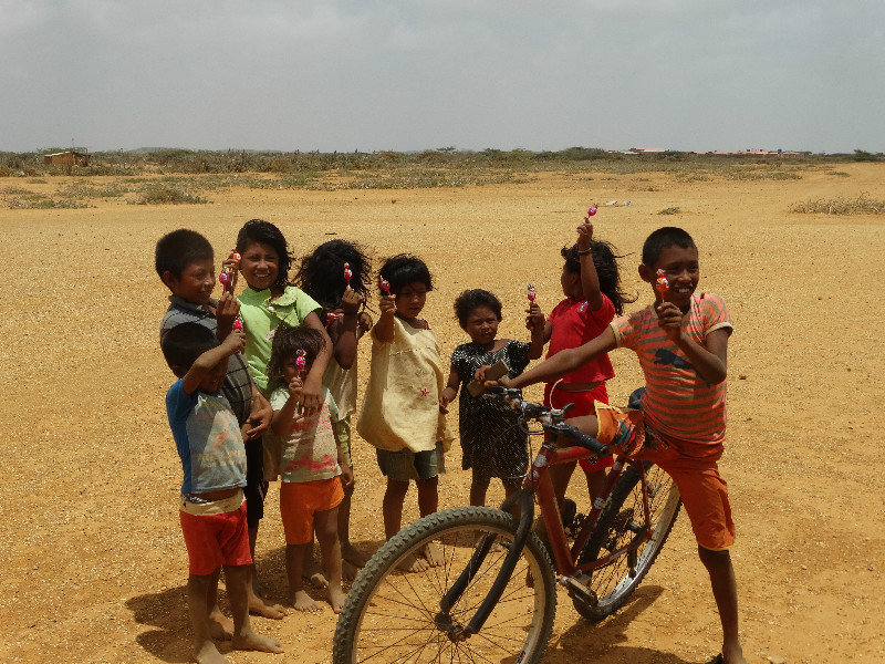 Wayuu children show off their bounty