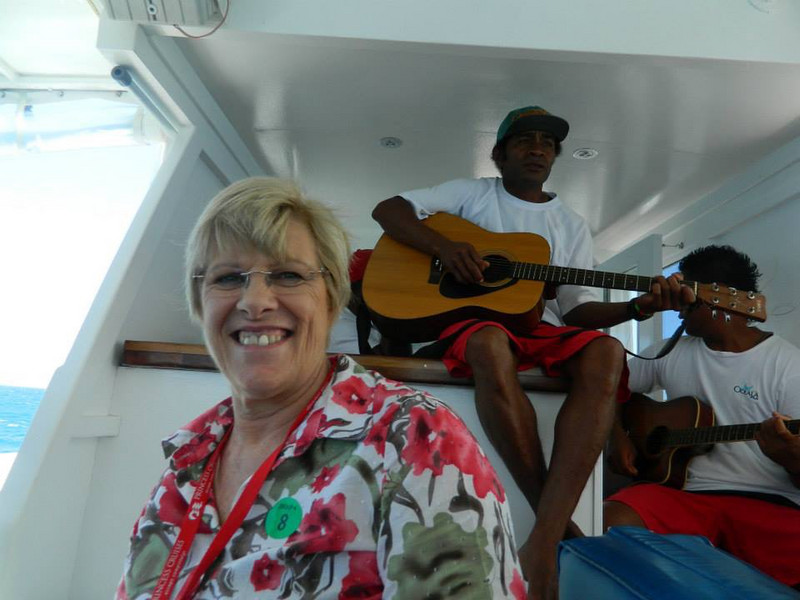 Being serenaded by some Fijian locals .
