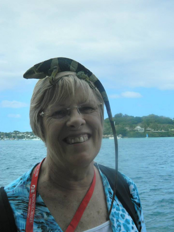 Mum with a lizard on her head