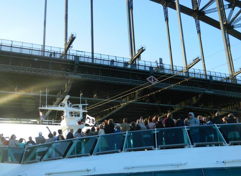 The ship going under the Sydney Harbour Bridge,