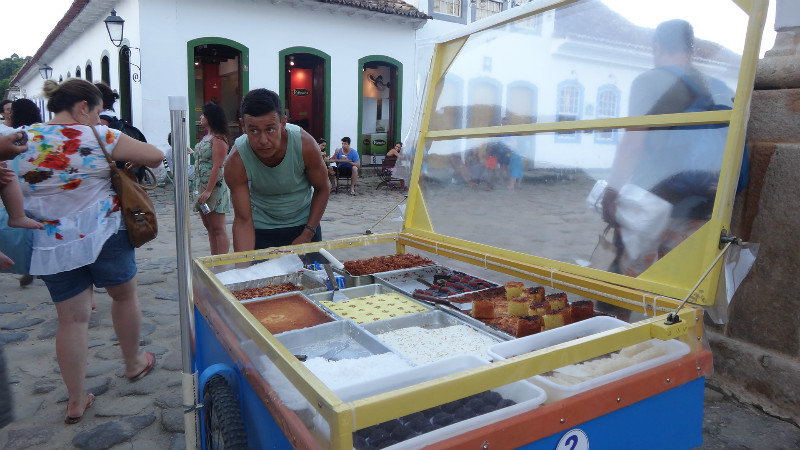 Street vendors selling sweets on the streets of Paraty