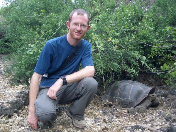 Ryan and a tortoise at the Charles Darwin Station