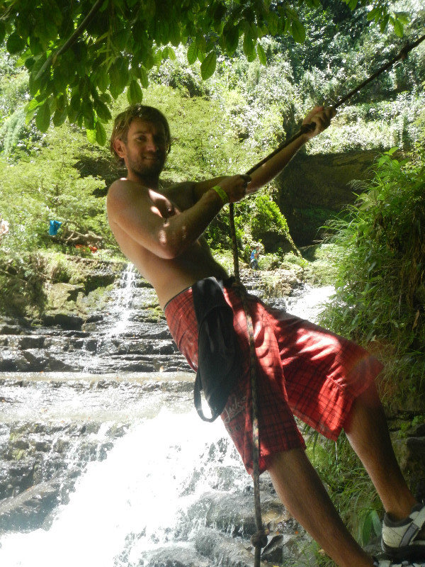 Climbing down the waterfall from the swimming hole