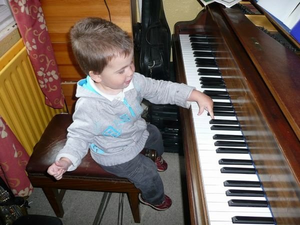 Playing Mary's piano