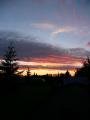 Spectacular sunset over the campsite as we hurry to put the tents up at the end of an emotional day.
