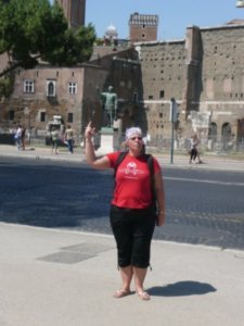 Imitating statues near the Colosseum