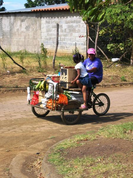 a woman pedaling some goods
