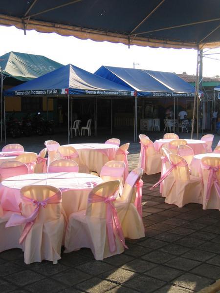 setting up for a wedding or party at the market
