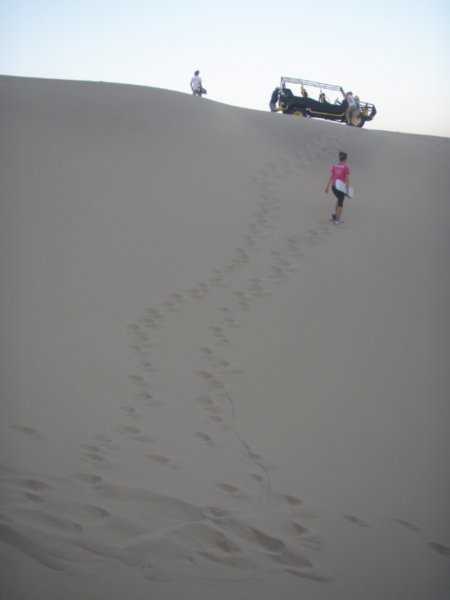 hiking up the dune