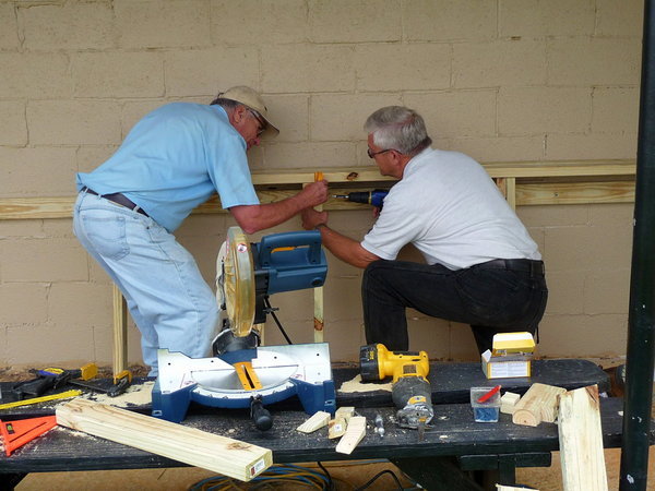 Bob & John are building benches