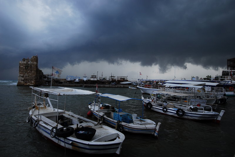 Byblos harbour with storm about to hit
