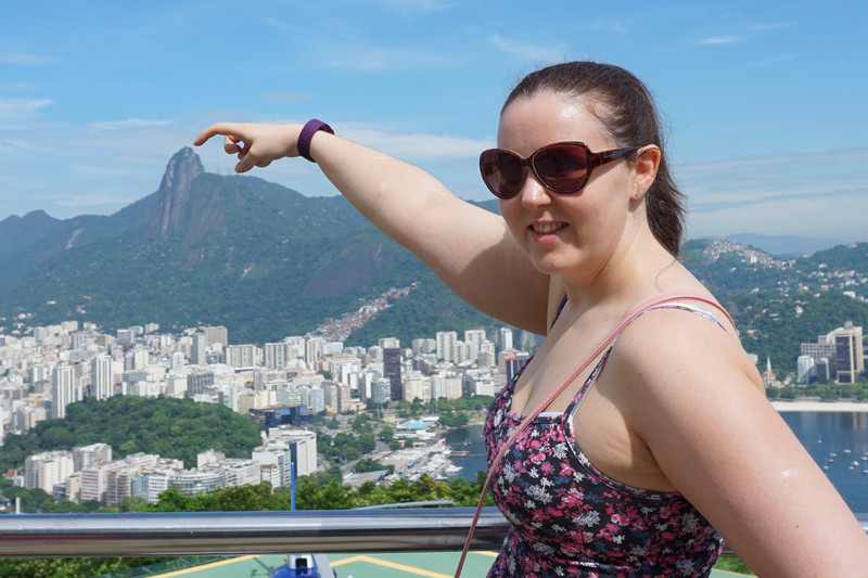 Steph pointing to the top of sugarloaf mountain 