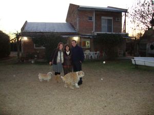 Outside the house with Cecelia and the dogs