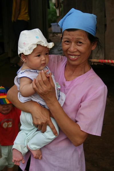 M'Lieng villager and baby
