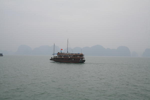 One of many tourist boats in Halong Bay