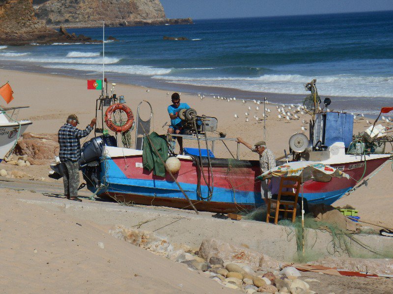 Busy fishermen in Salema
